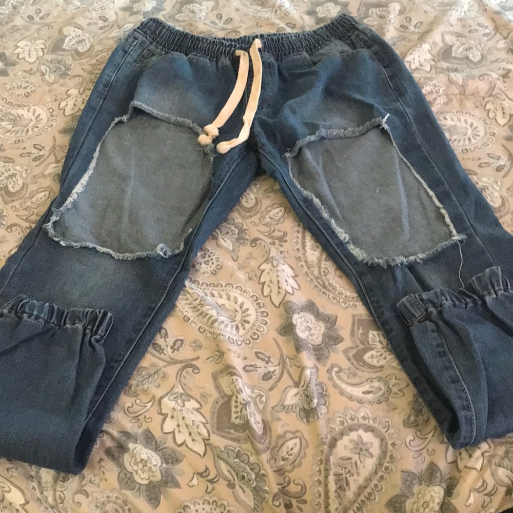 Open front leg elastic water and jeans size medium